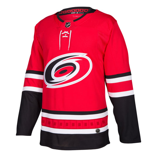 Maillot authentique professionnel domicile des Hurricanes de la Caroline de la LNH