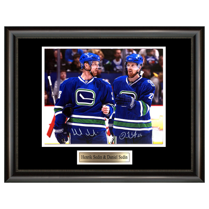 Henrik Sedin Vancouver Canucks Framed Autographed 8 x 10 Blue Jersey  Skating Photograph - Autographed NHL Photos at 's Sports Collectibles  Store