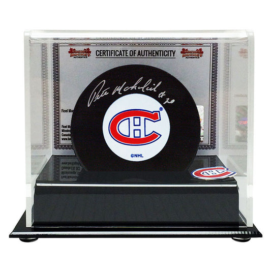 Peter Mahovlich a signé la rondelle des Canadiens de Montréal